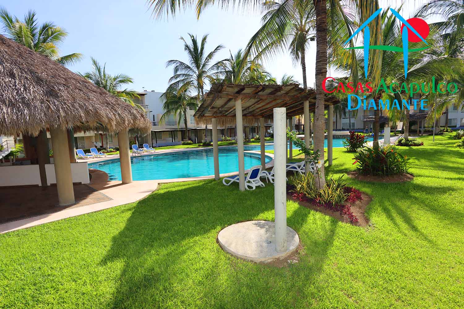 Residencial Caracol - Albercas y jardines 7